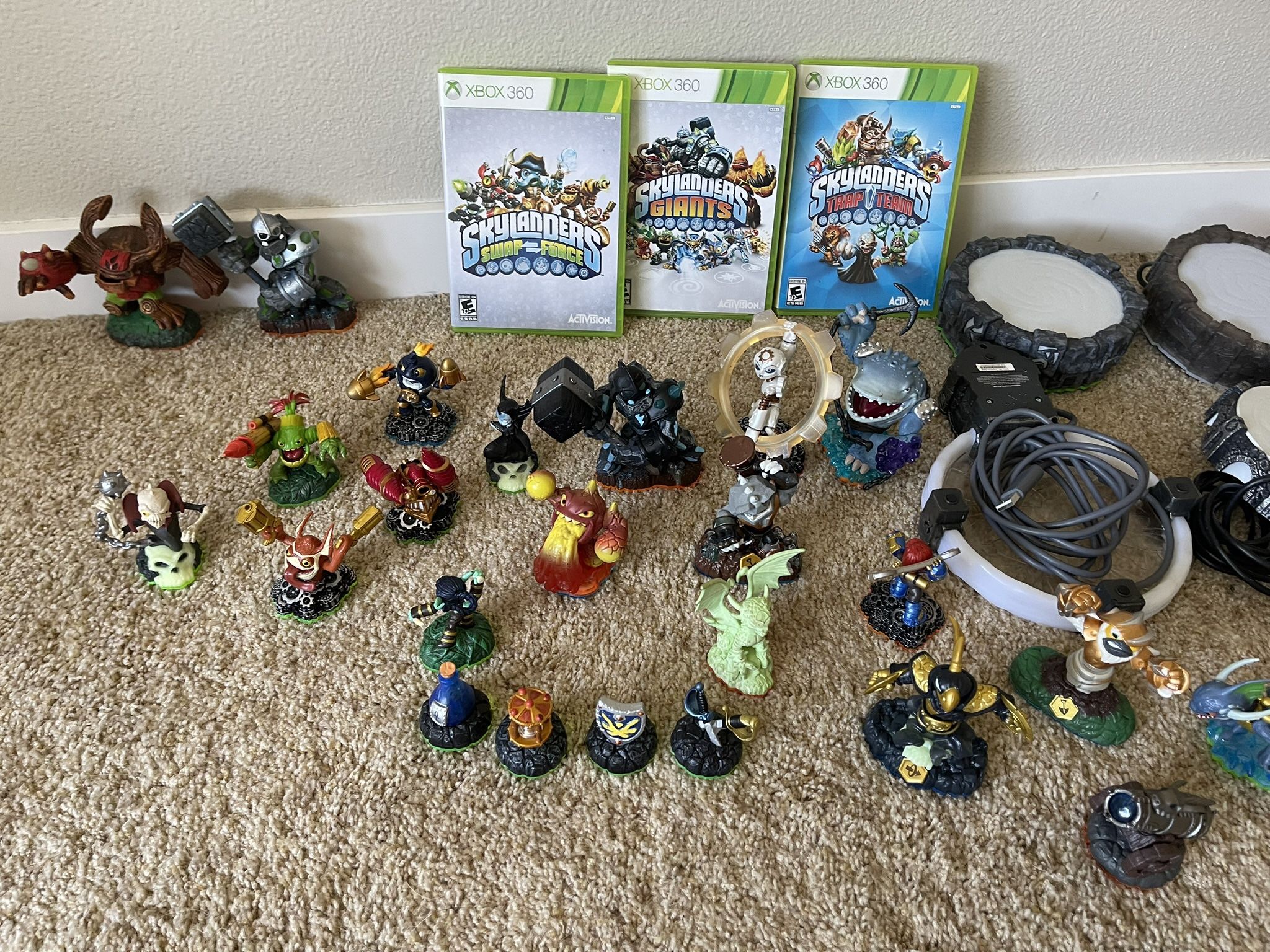 Huge Lot of 77 Skylander characters, 3 Xbox games, Four Portals.. selling as a set!