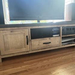 Wood and Finished Concrete Media Center