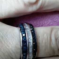 Rare Blue diamond band with natural clear baguette cut diamonds in the center.