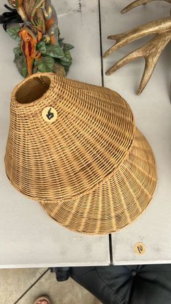 Two wicker lampshades
