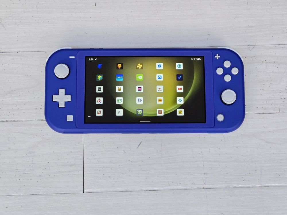 NINTENDO SWITCH LITE WITH LOTS GAMES