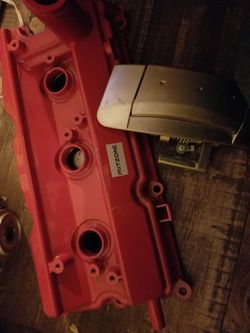 Valve Cover For A Nissan 350Z And Pssenger Door Handle 