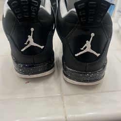 black white and grey jordan 4 retros