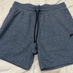 Fabletics the year round Terry short men’s size large 7” color grey new no tags pockets on the sides