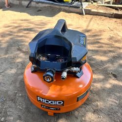 RIDGID
6 Gal. 150 PSI Portable Electric Oil-Free Jobsite Pancake Air Compressor with Dual Pressure Gauges and 2-Quick Couplers