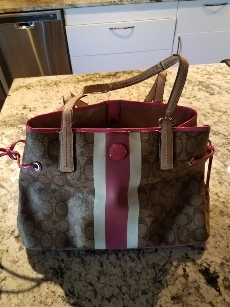 Coach signature handbag with pink and white stripe for Sale in