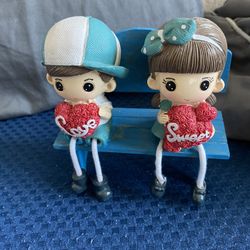 Wooden Dolls And Bench