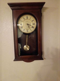 Howard Miller wall mounted grandfather's clock