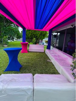 Cocktail table, truss and white couch