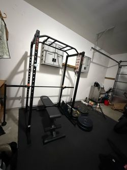 Like new GRIND fitness squat rack, bench, weights, and barbell