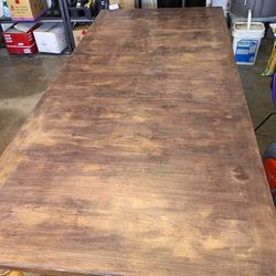 Solid wood farmhouse-style dining table