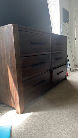 Brown 6 draw sliding dresser