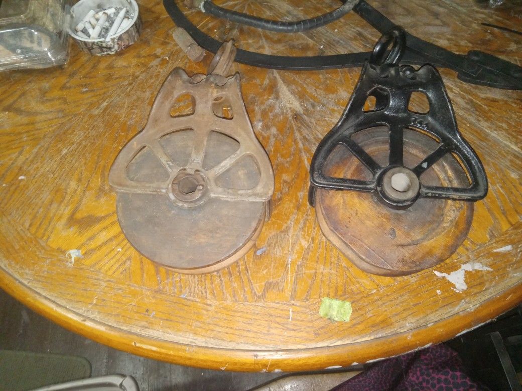 Vintage Cast Iorn Hay Car Pulleys