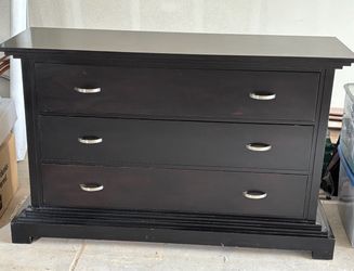 Black or dark Brown 3 door dresser