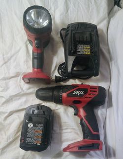 Skil 18v Driver, Spotlight, Battery, And Charger