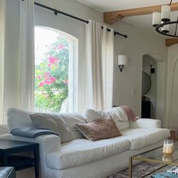 White Slipcovered Sofa 