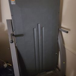 Gray treadmill opens up , stands up used but great condition