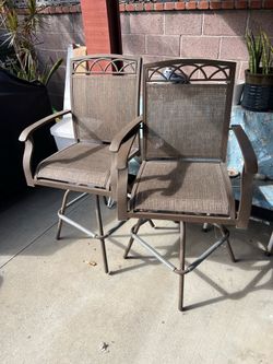 Used 2 outdoor chairs