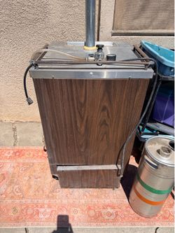 Keg with beer tap and keg of beer