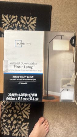 Angled down bridge floor lamp