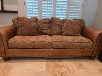 Four piece couch, ottoman, and two club chairs