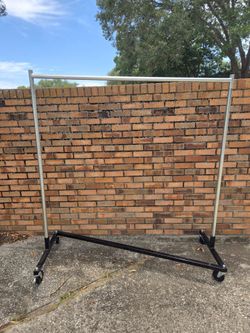 coat rack clothes rack with industrial wheels.