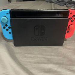 Nintendo Switch regular Model with dock and charger. 256 gigs of storage.