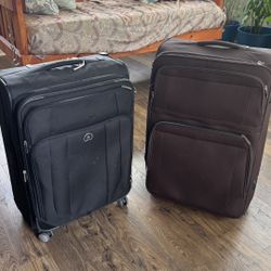 2 Checked-in Luggage Bags