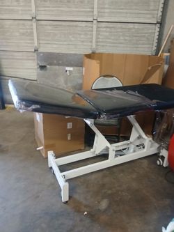 Electric examination table