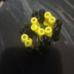 Yellow and black cuff