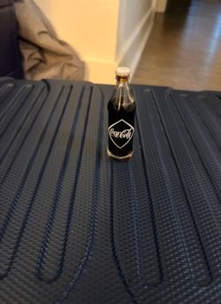 Antique Miniature Coca-Cola bottle.