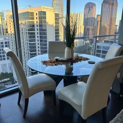 Circle Dining Table And 4 Chairs Set $250