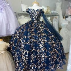 Navy blue and gold embroidered ball gown or quince dress