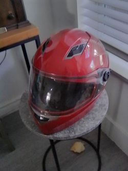 DOT motorcycle or scooter helmets for male and female size small asking $45 just a few scratches make me an offer