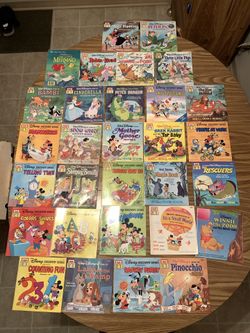 Children Books 54 of them with read along tapes and sing-a-longs.  Disney, Sesame Street and much more