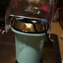 NEW UNUSED POPCORN MAKER.