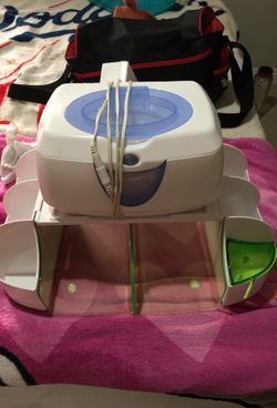 Wipe warmer + diaper organizer
