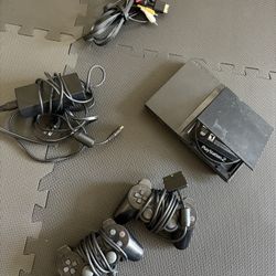 PS2 Slim With Controllers Cords And Games
