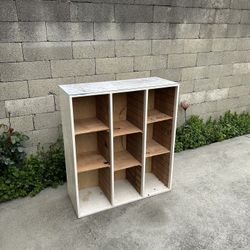 Two Brown and White Garage Storage Cabinets. 