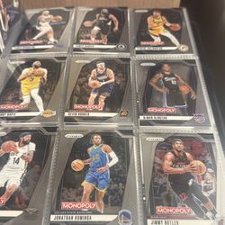 Monopoly basketball cards binder also a binder with Pokémon cards