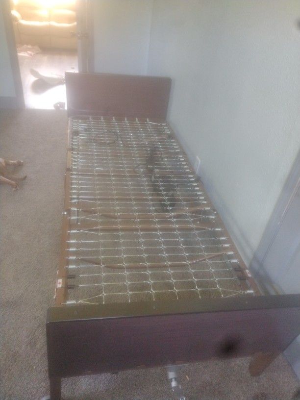 Old Hospice Bed It's Used But I Do Have The Mattress Too It's A Plastic Mattress The Bed It's New With A Crank On The Side And A Electric Button