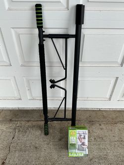 Pull-up bar with Ab core straps.
