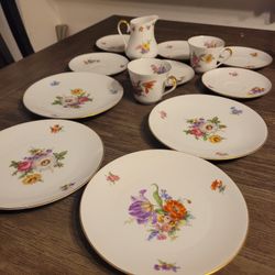 Antique Teacups And Plates