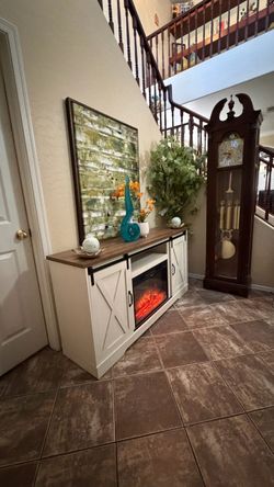 Beautiful white farmhouse fireplace /tv stand in excellent condition