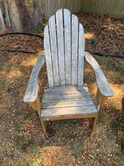 4 wooden Adirondack chairs