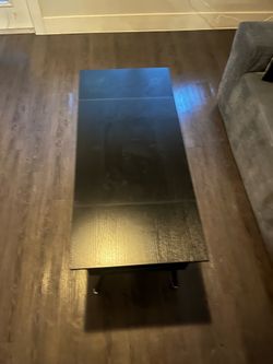 Modern Black Coffee Table - Wood-Grain Top, Open Storage