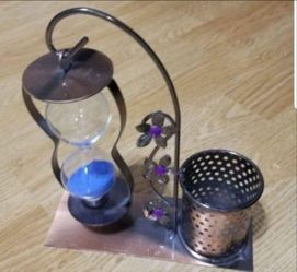 Creative office desktop organizer with vintage-style metal hourglass