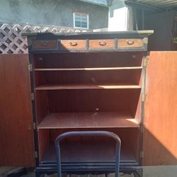Cabinet  With 4 Small Drawers And 3 Shelfs  Has Brass Hinges On It  