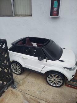 KIDS TOY 12 VOLT ELECTRIC LAND ROVER CAR(READ DESCRIPTION)