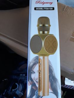 Sing a long microphone speaker with FM radio and mini SD card player